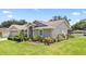 Lovely single-story home featuring stucco and siding with a beautifully landscaped front yard at 22852 Fern Ct, Land O Lakes, FL 34639