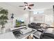 Cozy living room with a modern entertainment center and comfortable seating arrangement at 22852 Fern Ct, Land O Lakes, FL 34639