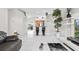Open-concept living room with a view of the kitchen and breakfast bar at 22852 Fern Ct, Land O Lakes, FL 34639
