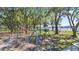 The playground features swings and is located near the lake and picnic area at 22852 Fern Ct, Land O Lakes, FL 34639