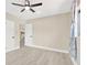 Bedroom featuring modern doors, modern paint, and modern curtains at 2303 E Osborne Ave, Tampa, FL 33610