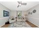 Spacious living room with neutral decor, ceiling fan and recessed lighting at 2311 64Th Street W Ct, Bradenton, FL 34209