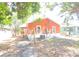 Back exterior of a single story home with trees and utility connections at 2326 Melrose S Ave, St Petersburg, FL 33712