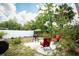 Outdoor patio area with grill and seating, perfect for entertaining or relaxing at 2403 E Osborne Ave, Tampa, FL 33610
