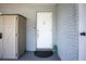 Charming front entrance boasts a stylish white door and a modern brick facade at 2403 E Osborne Ave, Tampa, FL 33610