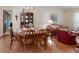 Dining room with seating for six and access to the living area at 2517 Bucknell Dr, Valrico, FL 33596