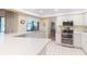 Bright kitchen with stainless steel appliances, tile flooring, and white cabinetry at 2517 Bucknell Dr, Valrico, FL 33596