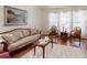 Living room with natural light featuring hardwood floors, and neutral-toned furniture at 2517 Bucknell Dr, Valrico, FL 33596