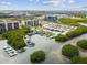 Aerial view of the marina with boats, docks, mangroves and community buildings in the background at 2620 Cove Cay Dr # 704, Clearwater, FL 33760