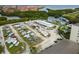 Aerial view of a boat and trailer storage facility along with the nearby marina and apartments at 2620 Cove Cay Dr # 704, Clearwater, FL 33760