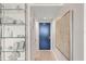 Bright hallway featuring a modern console, decorative art, and access to a sleek, minimalist interior at 2620 Cove Cay Dr # 704, Clearwater, FL 33760