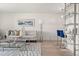 Contemporary living room featuring a stylish sofa, glass coffee table, modern lighting, and elegant decor at 2620 Cove Cay Dr # 704, Clearwater, FL 33760