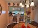 Cozy dining area with wood floors and convenient breakfast bar at 2625 State Road 590 # 913, Clearwater, FL 33759