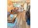 Open floor plan featuring a dining area connecting to the living room at 2625 State Road 590 # 913, Clearwater, FL 33759