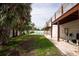 Spacious backyard with an inviting pool and exterior access from wooden balconies at 2807 57Th S St, Gulfport, FL 33707