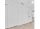 Simple bedroom features a closet and light-colored wood floors at 2807 57Th S St, Gulfport, FL 33707