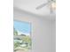 Bedroom with view of neighborhood through window at 2807 57Th S St, Gulfport, FL 33707