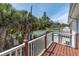 Upper deck overlooking the lush greenery and private pool area at 2807 57Th S St, Gulfport, FL 33707