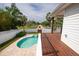 Inviting deck overlooking pool area with lush landscaping at 2807 57Th S St, Gulfport, FL 33707