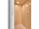 Luxurious elevator with wood-grain paneling and modern control panel at 2807 57Th S St, Gulfport, FL 33707