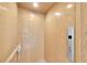 The inside of a home elevator with a sleek, modern design and controls at 2807 57Th S St, Gulfport, FL 33707