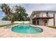 Beautiful backyard pool with spa, patio, and upper deck at 2807 57Th S St, Gulfport, FL 33707