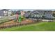 A bright, colorful community playground is nestled within a manicured landscape offering fun for and families at 28547 Hillcrest Valley Blvd, Wesley Chapel, FL 33543