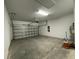 Spacious two-car garage offering ample storage and parking space at 28547 Hillcrest Valley Blvd, Wesley Chapel, FL 33543