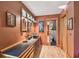 This bathroom features wood floors, custom cabinets, and unique lighting at 3112 W Wallcraft Ave, Tampa, FL 33611