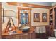 Charming bathroom with wood vanity, vessel sink, and decorative accents at 3112 W Wallcraft Ave, Tampa, FL 33611
