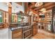 Gourmet kitchen boasting stainless steel appliances, custom cabinetry and natural light at 3112 W Wallcraft Ave, Tampa, FL 33611