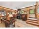 Cozy living room with fireplace, rocking chair, and natural light at 3112 W Wallcraft Ave, Tampa, FL 33611