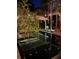 Relaxing courtyard pool with a covered structure and lush plants surrounding the area at 3112 W Wallcraft Ave, Tampa, FL 33611