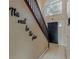 Grand entryway featuring a staircase, and a large arched window above the front door at 31747 Loch Aline Dr, Wesley Chapel, FL 33545