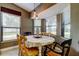 Cozy breakfast nook featuring natural light and a charming round table at 3410 Briarwood Ln, Safety Harbor, FL 34695