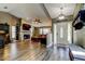 Spacious living room with high ceilings, fireplace, and seamless flow from the foyer at 3410 Briarwood Ln, Safety Harbor, FL 34695