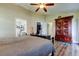 Elegant main bedroom with a view of the ensuite bathroom and walk-in closet at 3410 Briarwood Ln, Safety Harbor, FL 34695