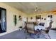 Relaxing covered patio featuring outdoor seating and decorative touches perfect for entertaining at 3410 Briarwood Ln, Safety Harbor, FL 34695