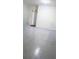 Clean garage with epoxy flooring is ready for your projects at 3446 Suncoast Plains Dr, Odessa, FL 33556