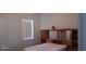 Bright bedroom featuring a large window, neutral walls, and carpet flooring at 3680 19Th S Ave, St Petersburg, FL 33711