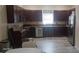 Modern kitchen with wood cabinets, stainless steel appliances, and plenty of counter space at 3680 19Th S Ave, St Petersburg, FL 33711