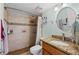Bathroom featuring a tiled shower and granite vanity at 4032 Cortez Dr # A, Tampa, FL 33614