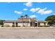 Commercial building with ample parking and palm trees for a professional business setting at 4032 Cortez Dr # A, Tampa, FL 33614