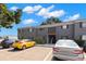 Well-maintained, gray two-story condo with ample parking spaces available for residents and visitors at 4032 Cortez Dr # A, Tampa, FL 33614