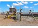 Community playground featuring swings, slide, and climbing wall for outdoor fun at 4032 Cortez Dr # A, Tampa, FL 33614