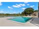 Community pool overlooking a tranquil lake, great for relaxation and outdoor enjoyment at 4032 Cortez Dr # A, Tampa, FL 33614
