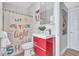 Updated bathroom features a modern vanity, bright lighting, and stylish fixtures at 4099 Pompano Se Dr, St Petersburg, FL 33705