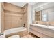 Modern bathroom featuring a tub and shower, updated vanity and modern fixtures at 4099 Pompano Se Dr, St Petersburg, FL 33705