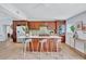 Modern kitchen featuring an island, stainless steel appliances, and ample cabinet space at 4099 Pompano Se Dr, St Petersburg, FL 33705