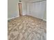 Bedroom featuring tile floors, closet and access to a doorway at 4117 Muriel Pl, Tampa, FL 33614